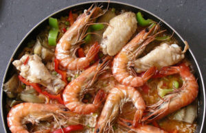 Gastronomia e prodotti tipici spagnoli Paella Valenciana - Piatto tipico spagnolo - foto Kristina Hoeppner flickr/com